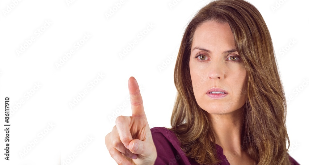 Serious woman pointing her finger at camera Serious woman pointing her finger at camera