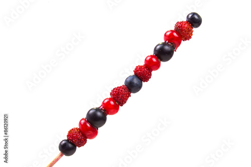 skewer with forest juicy tasty berries