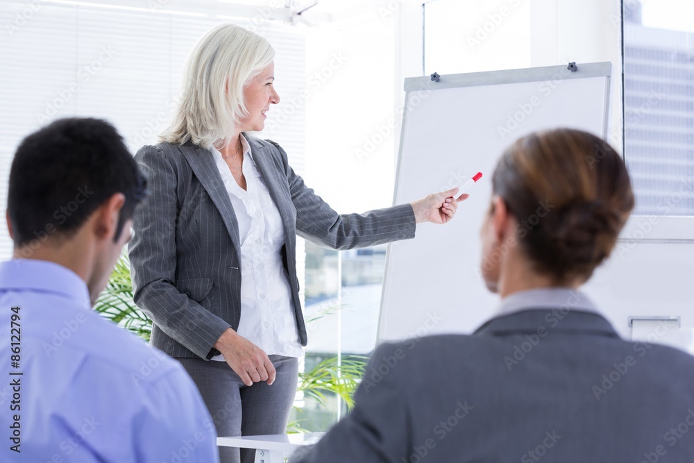 Obraz premium Business team looking at white screen 