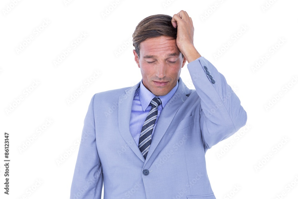  Stressed businessman getting a headache