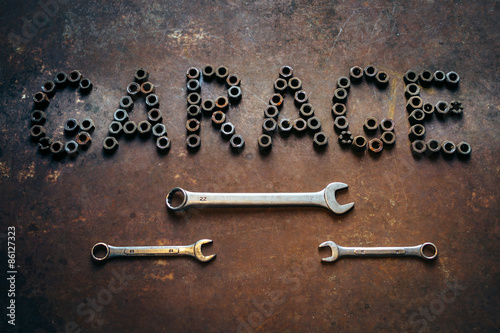inscription Garage and wrenches