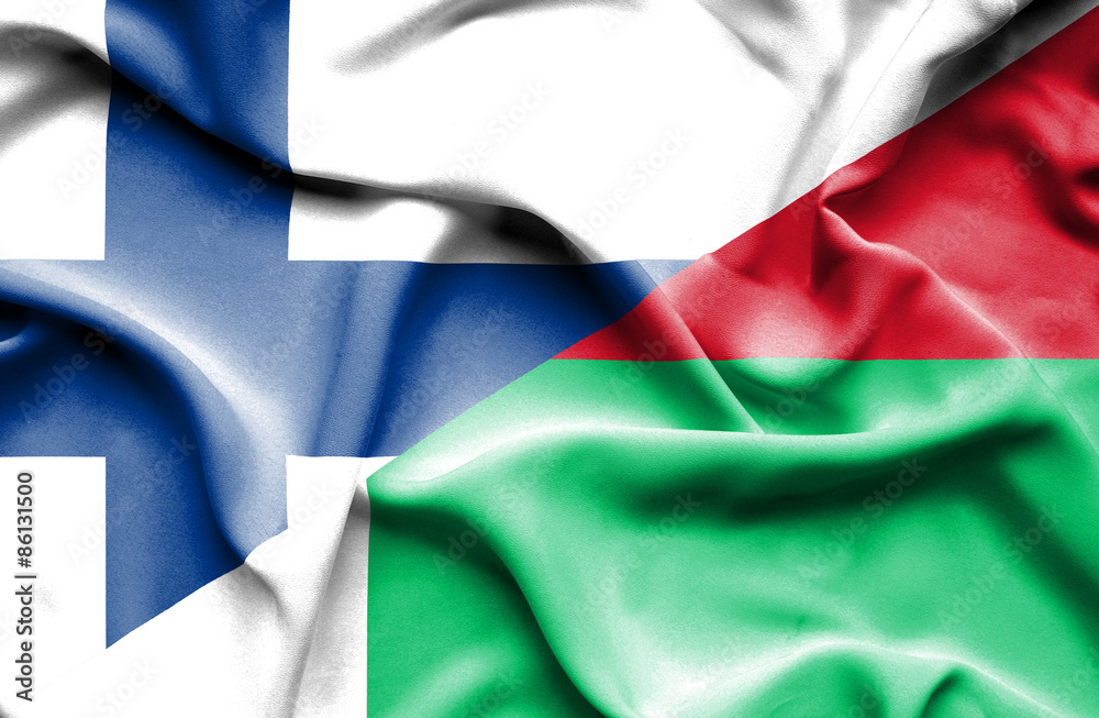 Obraz premium Waving flag of Madagascar and Finland