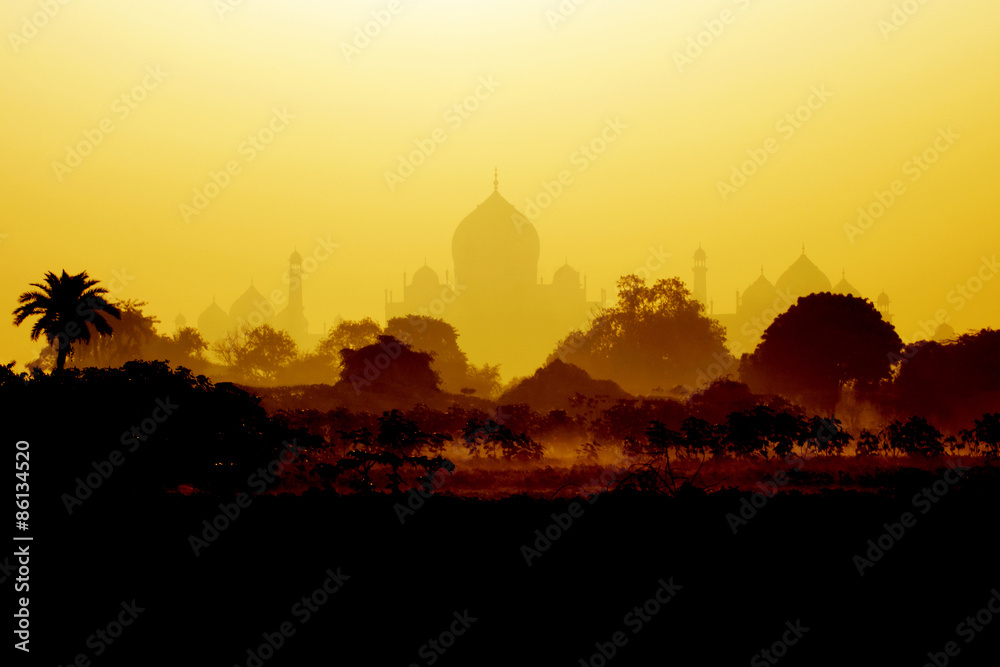 Taj Mahal on a foggy morning in India 