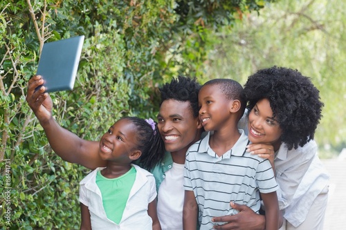 Happy family taking selfie with tablet pc © WavebreakmediaMicro