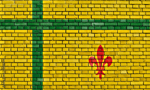 flag of Fransaskois painted on brick wall photo