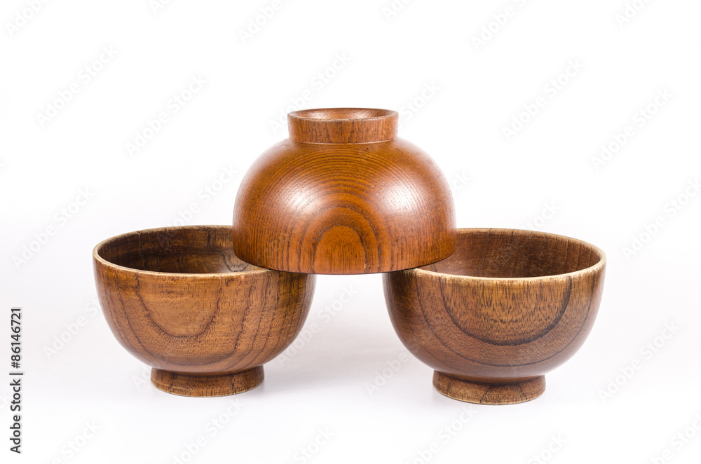Old wooden bowl isolated on white background Old wooden bowl isolated on white background