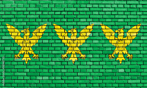 flag of Caernarfonshire painted on brick wall