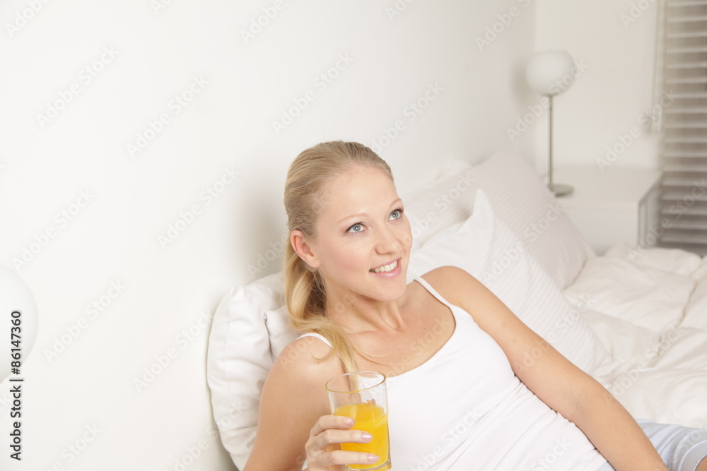 Pretty woman drinking a juice Pretty woman drinking a juice