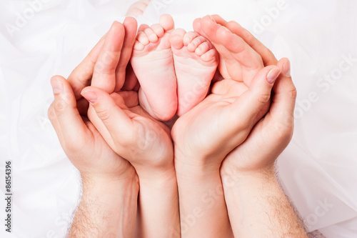 hands of parents