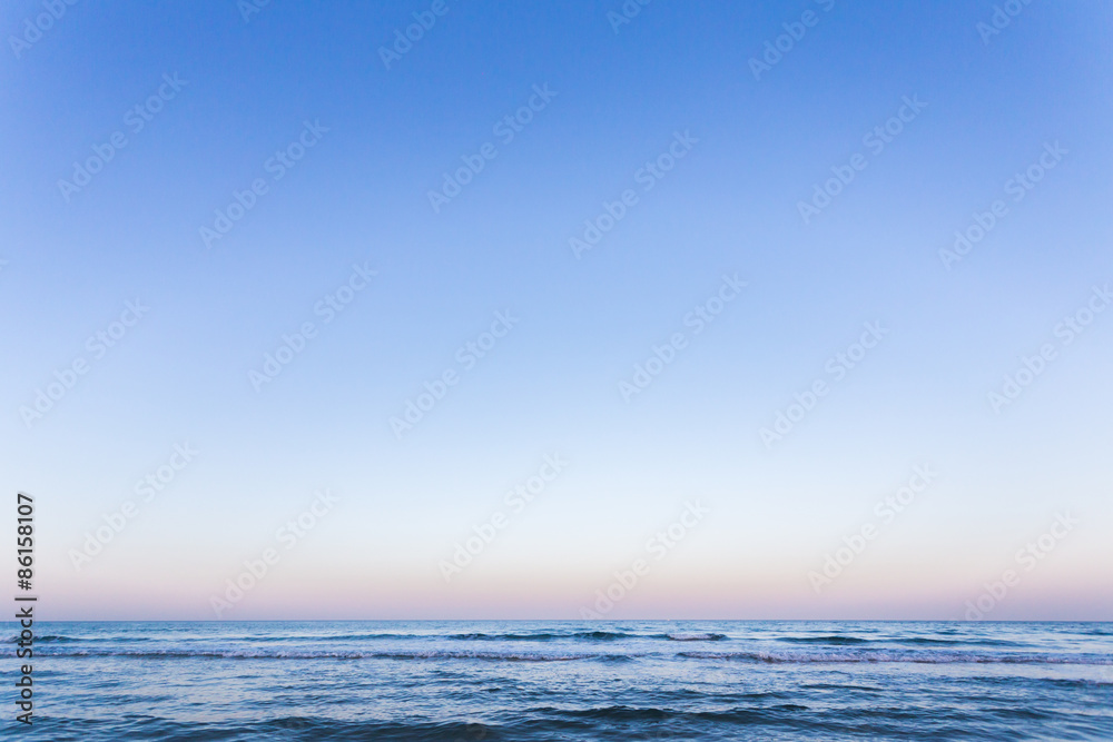 Fototapeta premium Sunset sunrise on the sea with beautiful waves