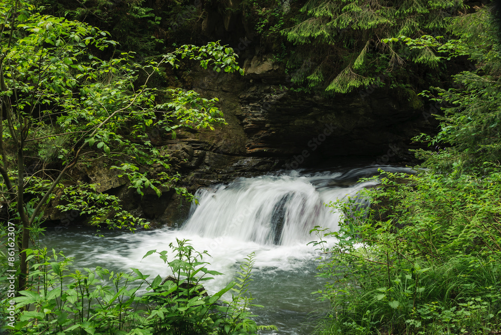 Waterfall on a mountain river