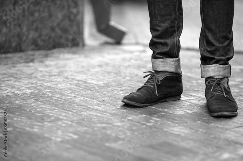 Confident man posing in selvedge jeans