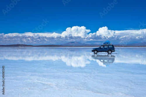 Reflection of car in Salar de Uyuni(Uyuni Salt Flat), Bolivia photo