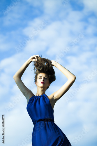 Pretty woman in blue dress