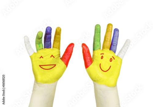 Smiley on colorful hands isolated on white.