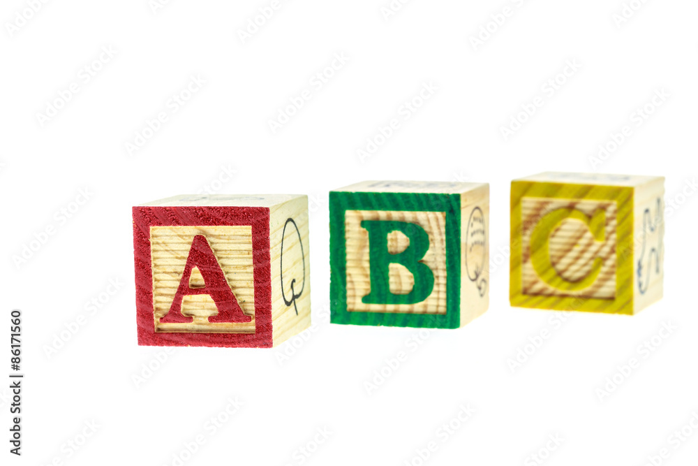 Close up ABC colorful alphabet blocks isolated on white Close up ABC colorful alphabet blocks isolated on white