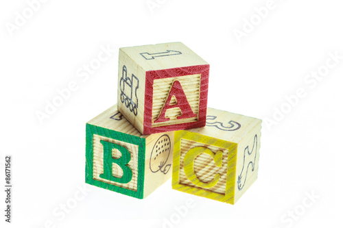 Close up ABC colorful alphabet blocks isolated on white