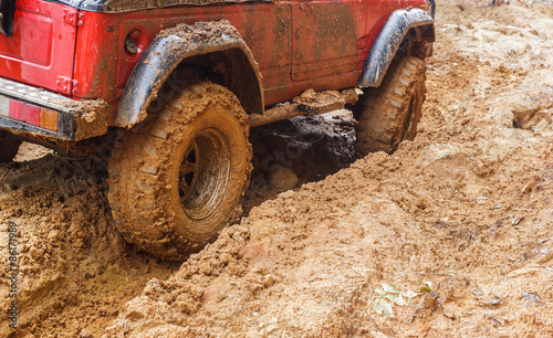 car tires in dirt road