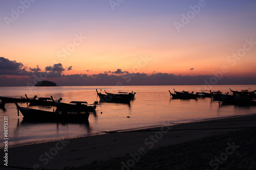 long tail boats at sunset at Koh Lipe