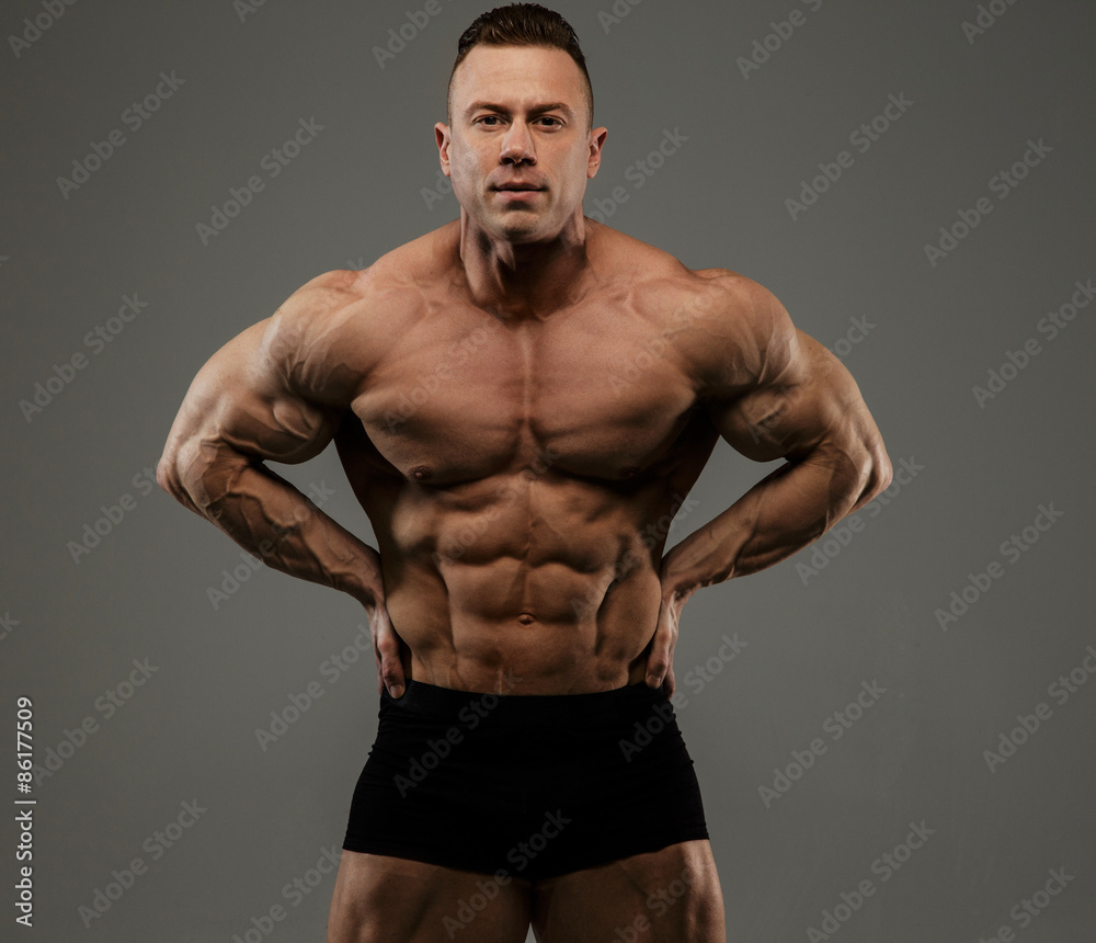 Fototapeta premium Big bodybuilder in black panties