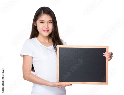 Young lady show with black board