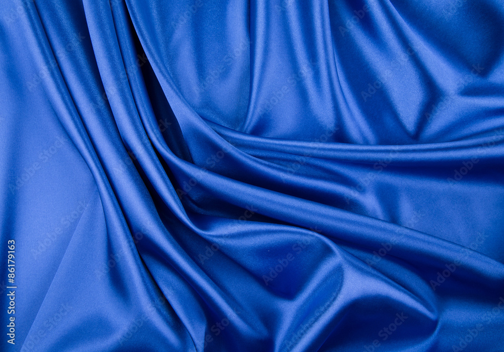 Fototapeta premium Blue silk drapery. 