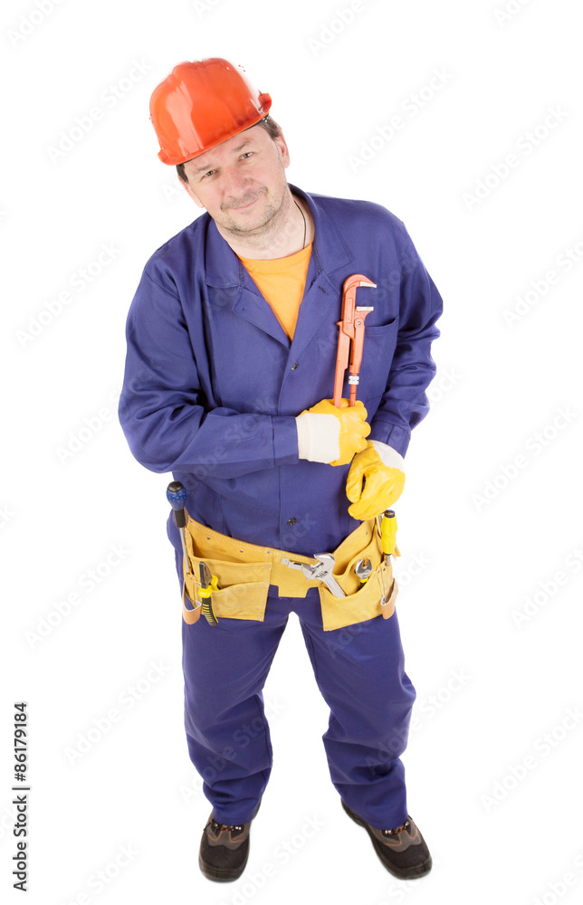 Worker in protective helmet with instruments. Worker in protective helmet with instruments.