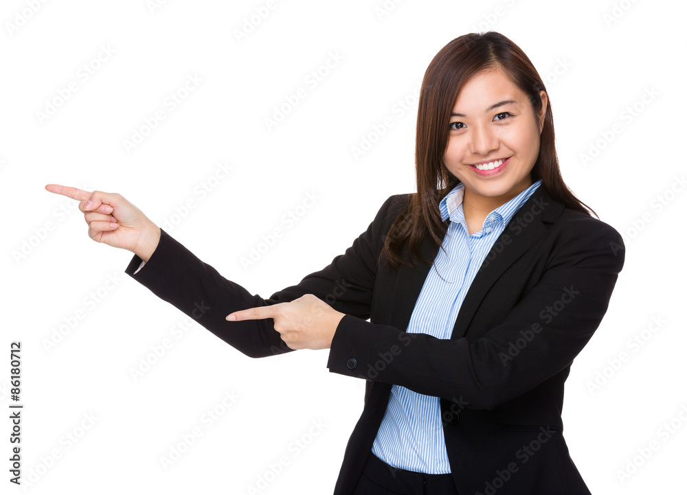 Young businesswoman with two finger point up Young businesswoman with two finger point up