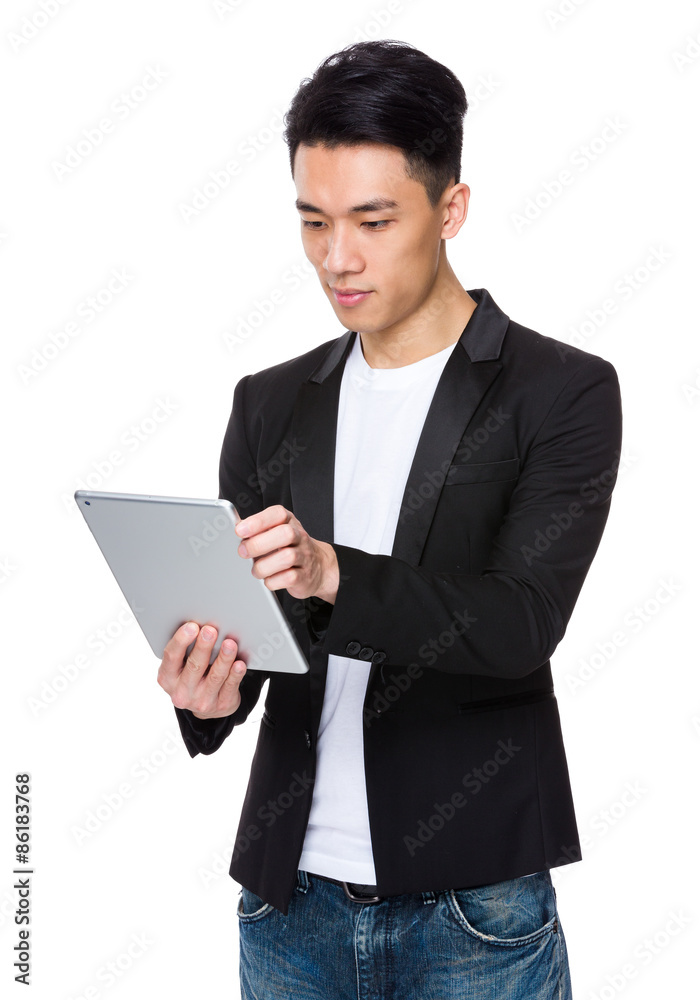 Young businessman use of notebook computer Young businessman use of notebook computer