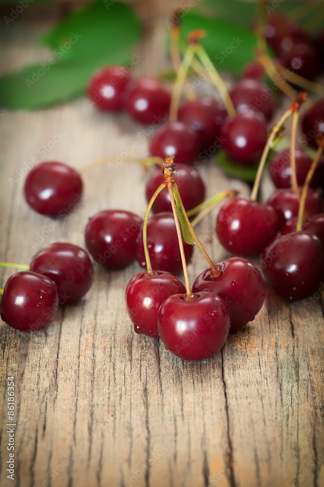 Sweet cherries on wooden board Sweet cherries on wooden board