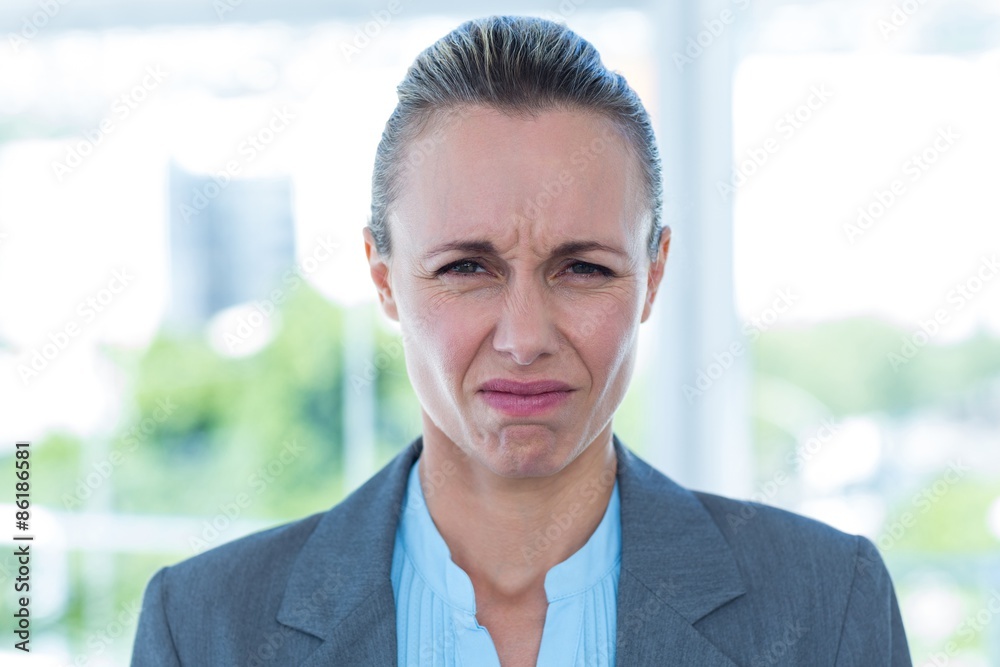 Upset businesswoman in an office