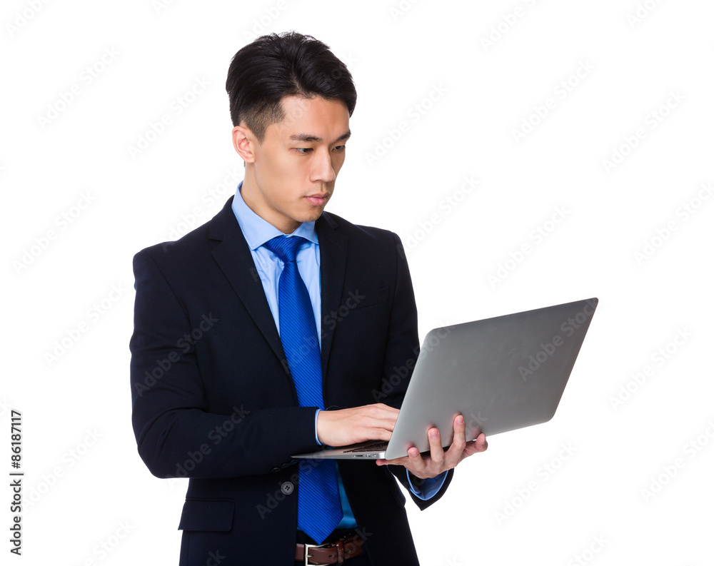 Asian businessman use of laptop computer Asian businessman use of laptop computer