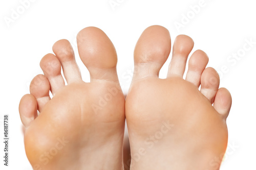 Closeup on bare female feet photo