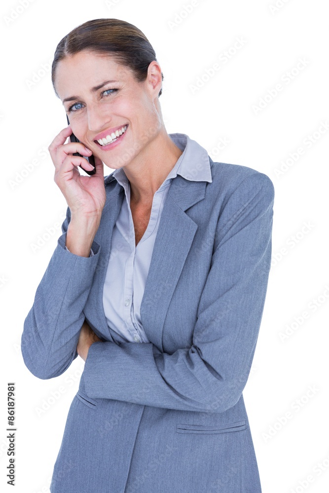 Businesswoman calling with her smartphone Businesswoman calling with her smartphone