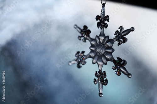 snow background on glass snowflake