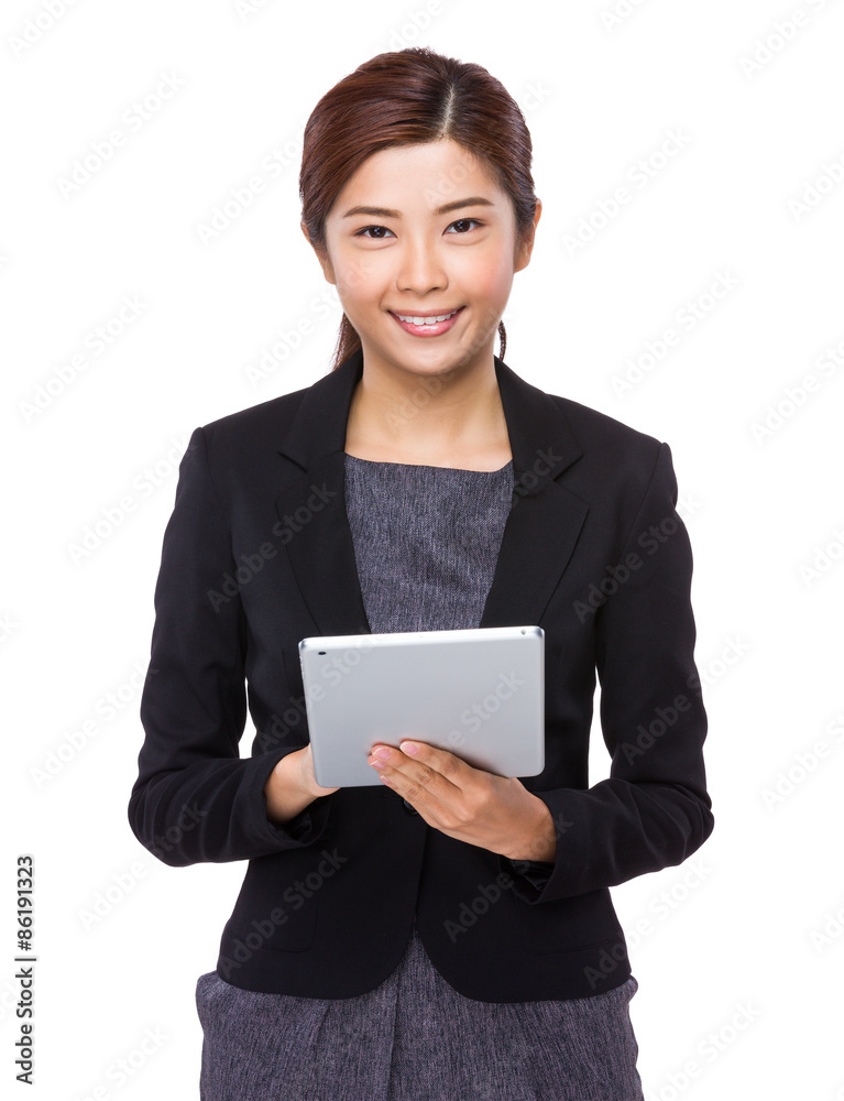 Businesswoman use of the digital tablet