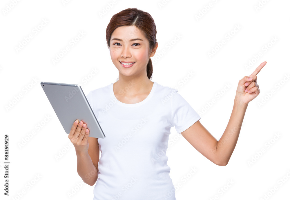 Woman use of digital tablet and finger point up