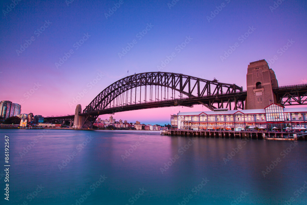 Beautiful sunset cityscape and harbour bridge.
