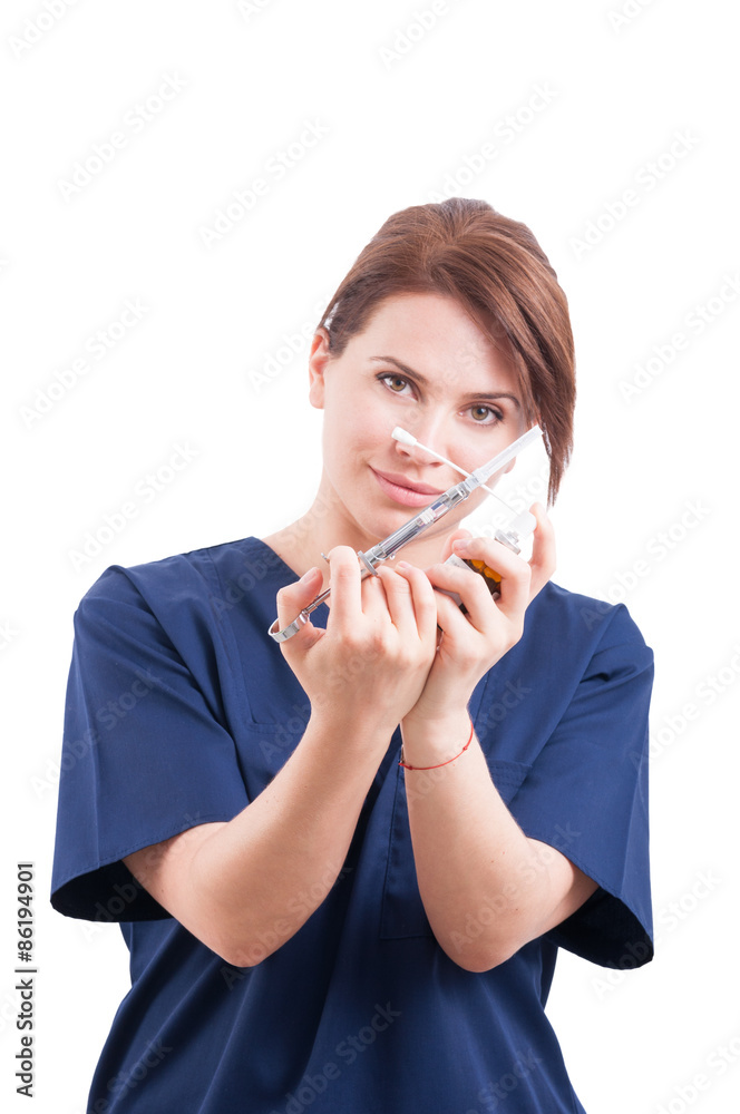 Dentist woman holding syringe and anesthetic Dentist woman holding syringe and anesthetic