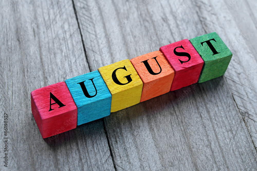 word august on colorful wooden cubes - obrazy, fototapety, plakaty 