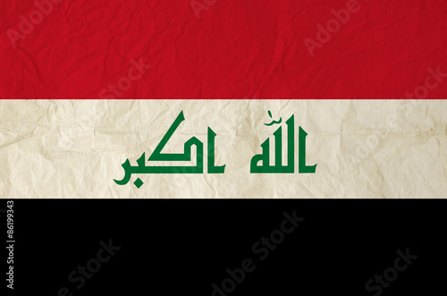 Flag of Iraq with vintage old paper texture photo