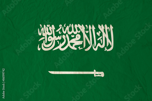 Flag of Saudi Arabia with vintage old paper texture