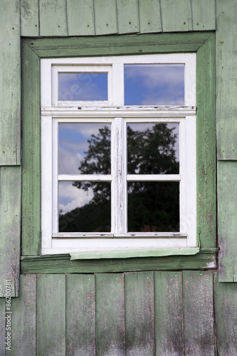 window of an old wooden house