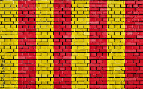 flag of Northumbria painted on brick wall