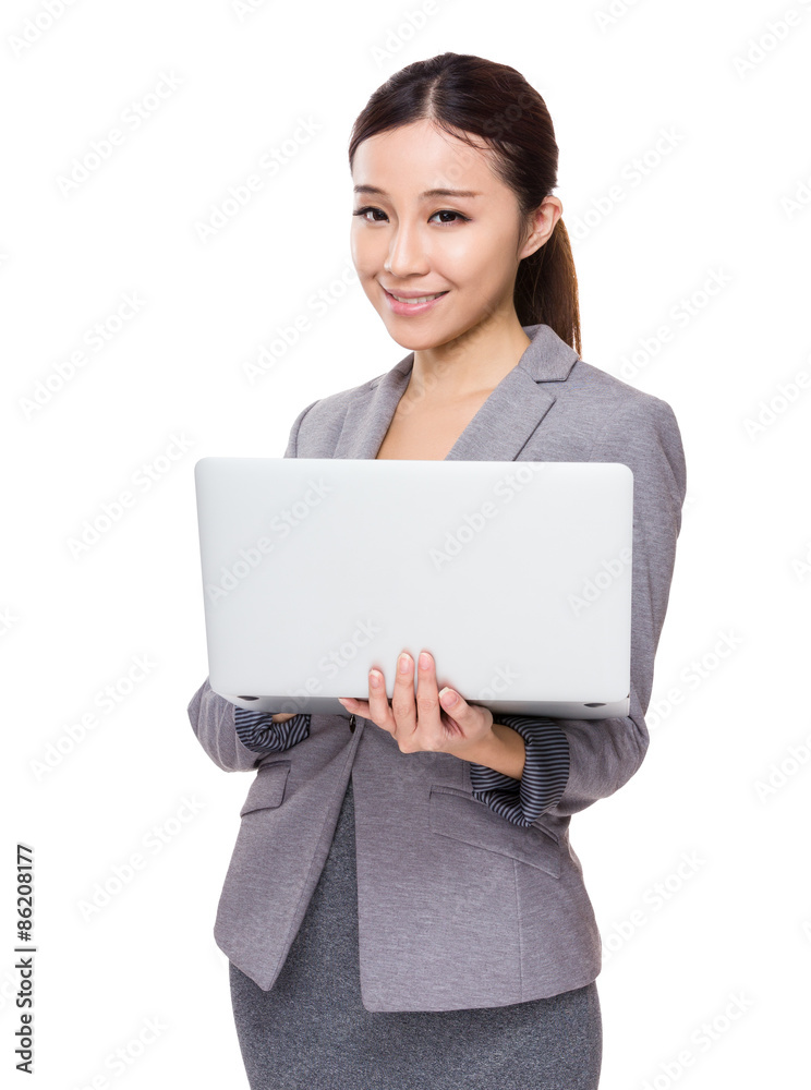 Young Businesswoman hold with notebook computer Young Businesswoman hold with notebook computer
