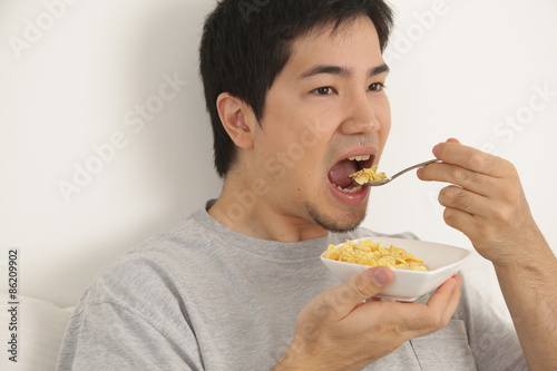 Man eating cereals