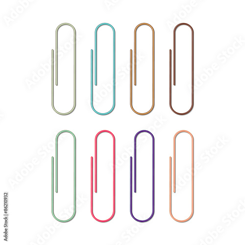 Set of colored paper clips on white
