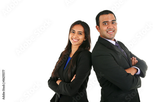Asian Indian businessman and businesswoman in group standing with folded hands isolated on white with copyspace. Successful Teamwork concept..