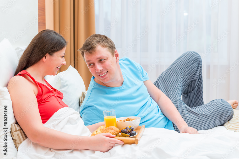 love happy couple eating breakfast in the morning