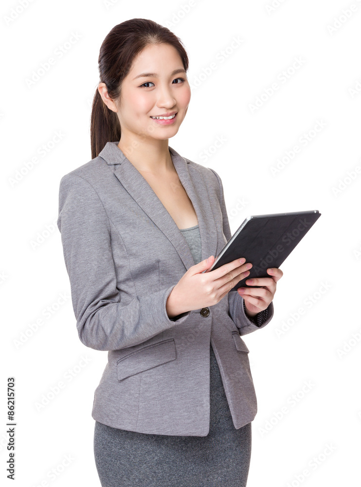 Young businesswoman use of the digital tablet Young businesswoman use of the digital tablet